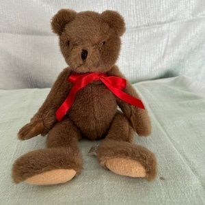 Vintage 1986, CMC Inc., Teddy Bear with red bow.